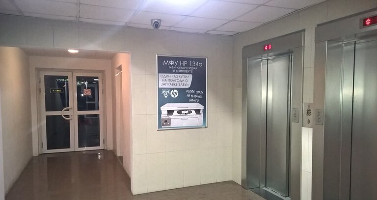 Pекламная кампания ООО «Компьютеры и периферия» на постерах в бизнес-центра Минска. Фотоотчет